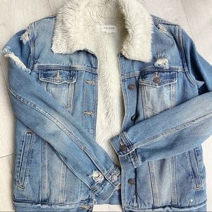 Distressed jean jacket with fur